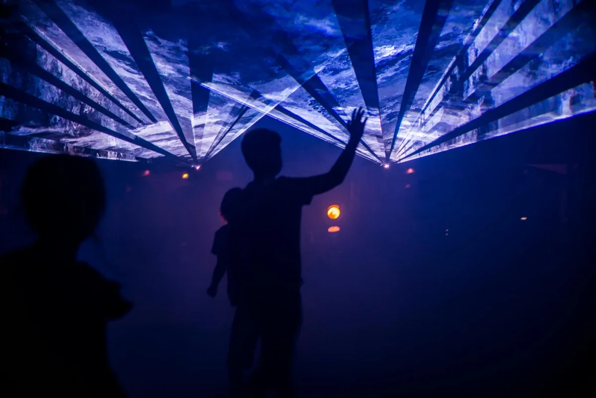 Immersive installation of projected light, scenery made of pixels